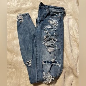 AE next level stretch ripped jeans
